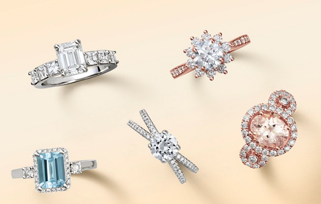 Multiple Blue Nile engagement rings with various settings and diamond cuts on a yellow background