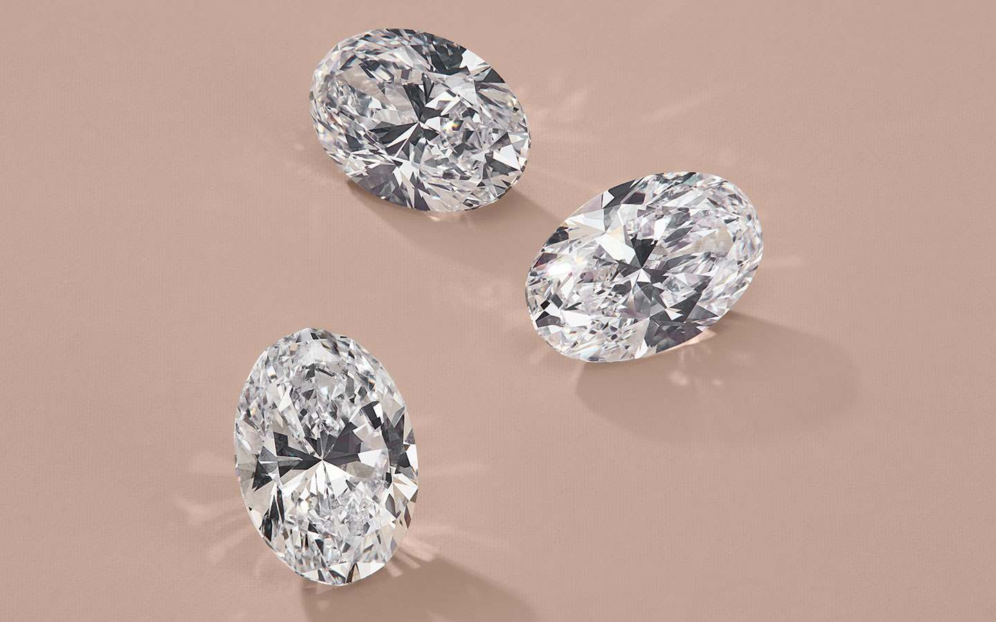 Three loose oval diamonds