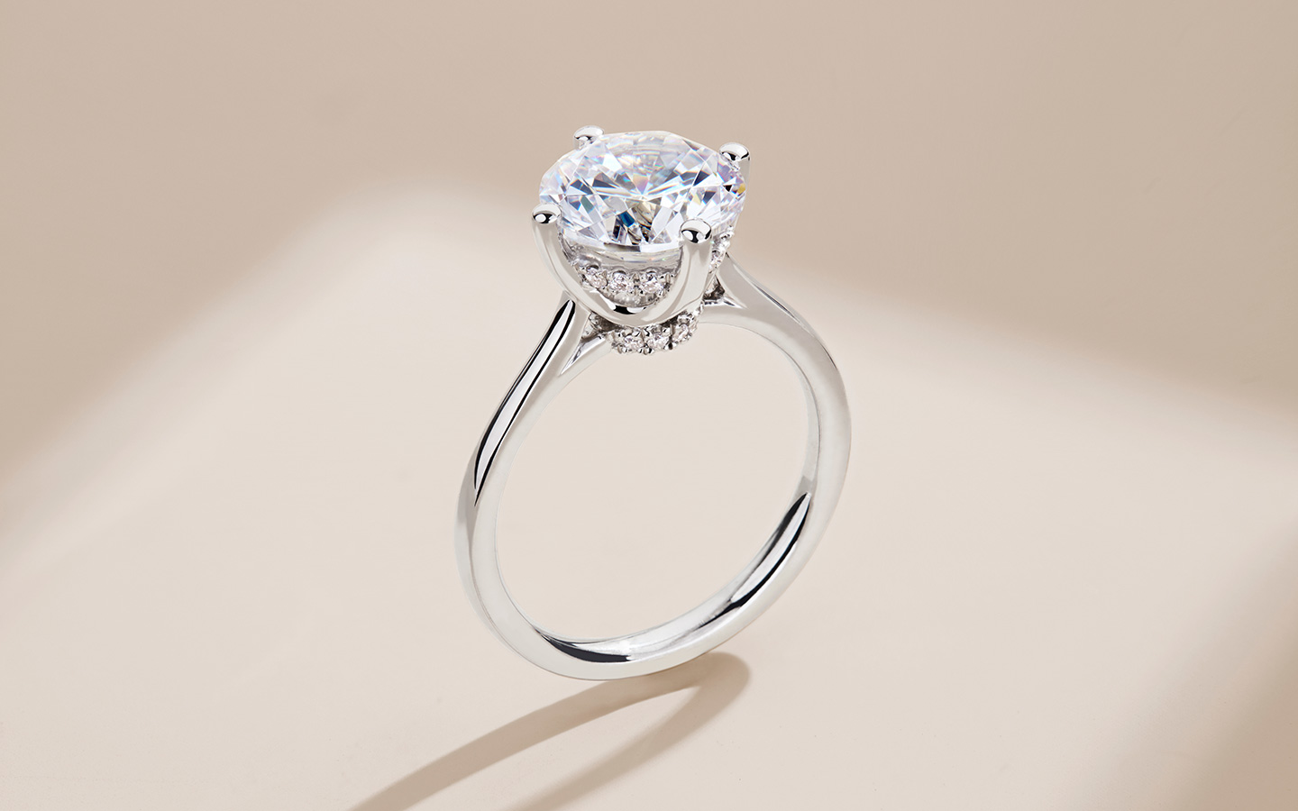 Hidden halo engagement ring in white gold with natural diamonds.