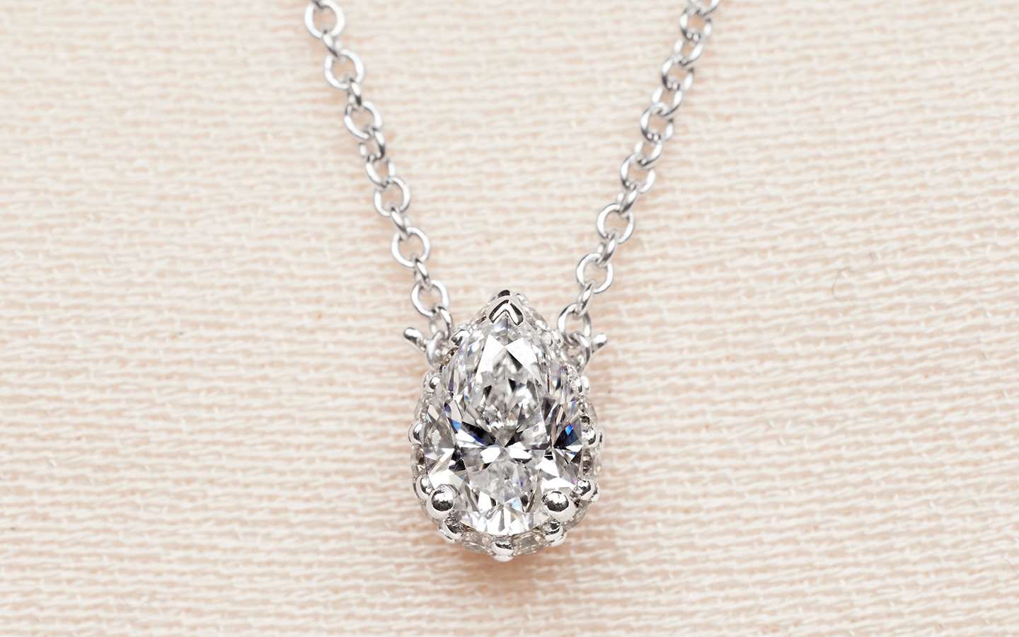 Pear shaped diamond necklace.