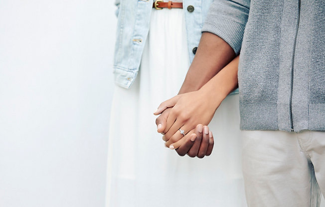 A couple holding hands