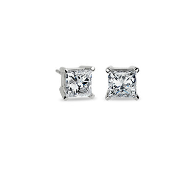 Diamond stud earrings on a white background