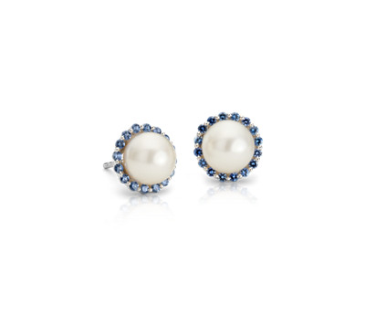 Pearl earrings with halos of blue gemstones