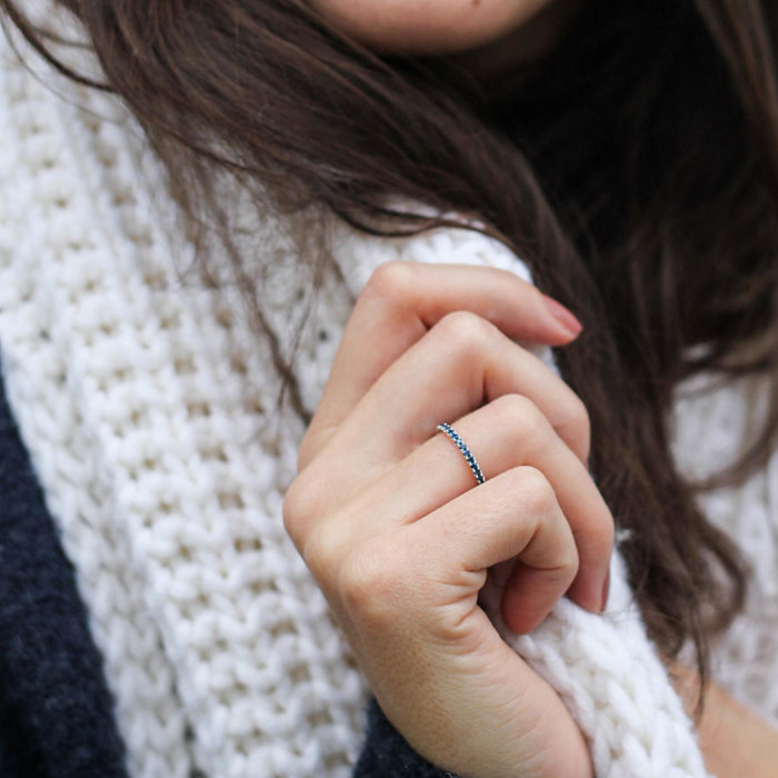 Close up of woman modeling jewelry 
