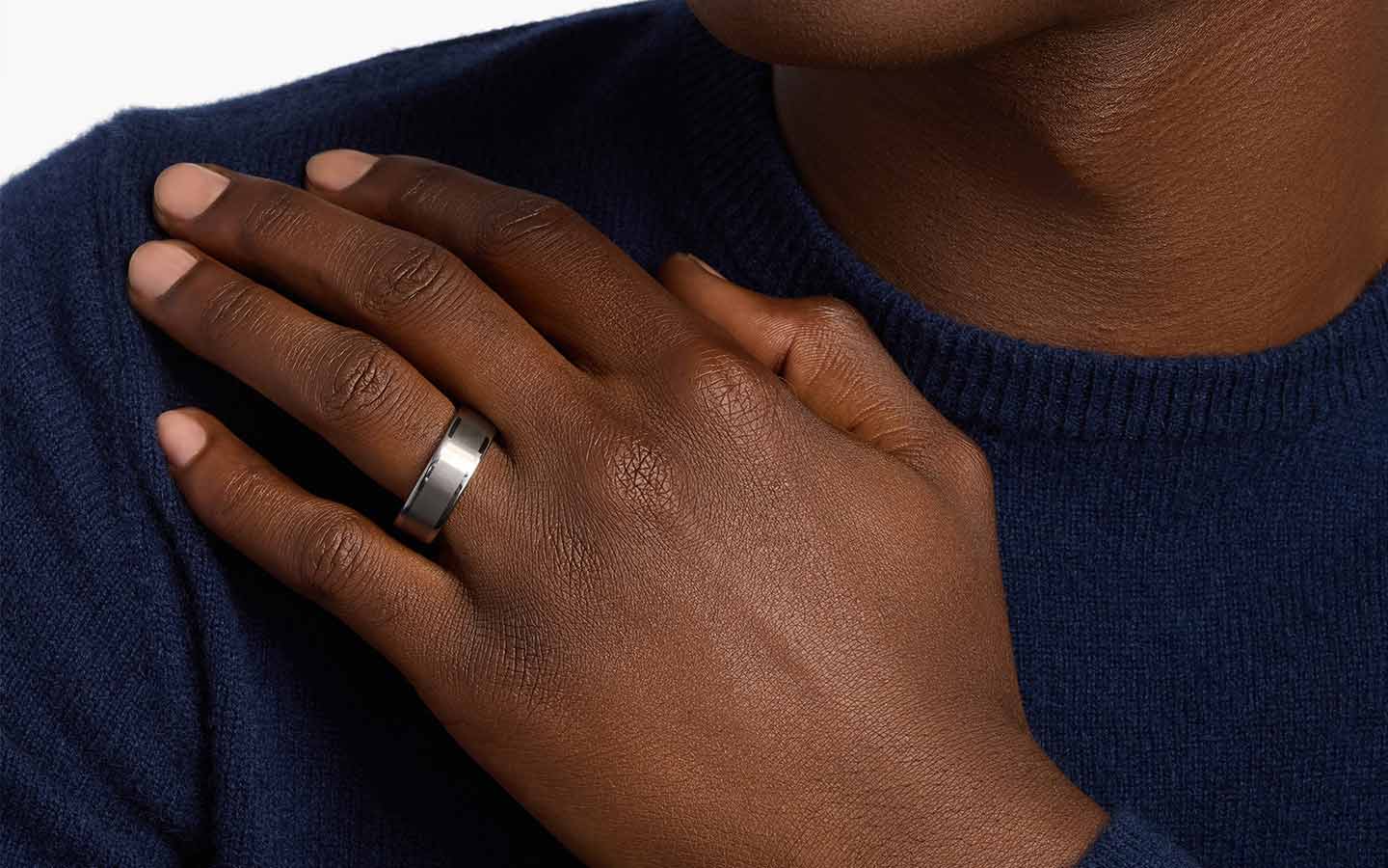 Close up of man's hand with wedding ring