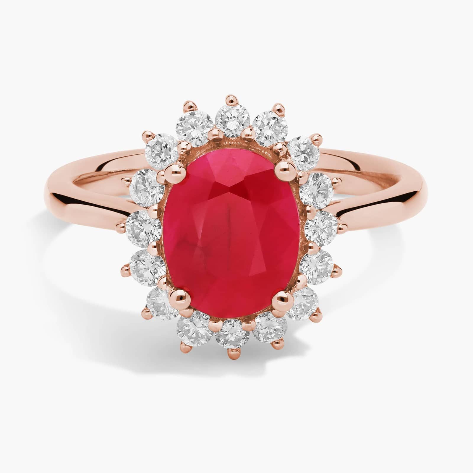 Oval Ruby and Diamond Sunburst Halo Ring in 14k Rose Gold