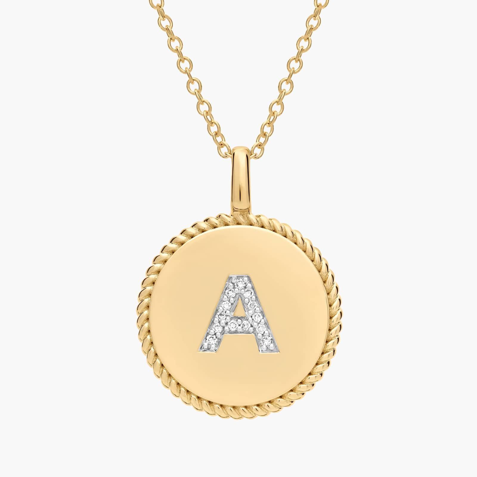 Diamond A pendant in yellow gold