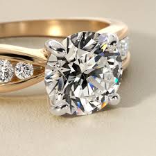 Bow-Tie Engagement Ring With Channel Set Round Diamonds In 14K Yellow Gold