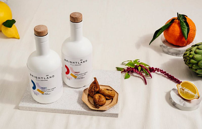 Brightland extra virgin olive oils displayed near aromatics