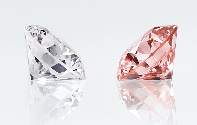 A white and pink diamond lightbox lab grown diamond on a white background