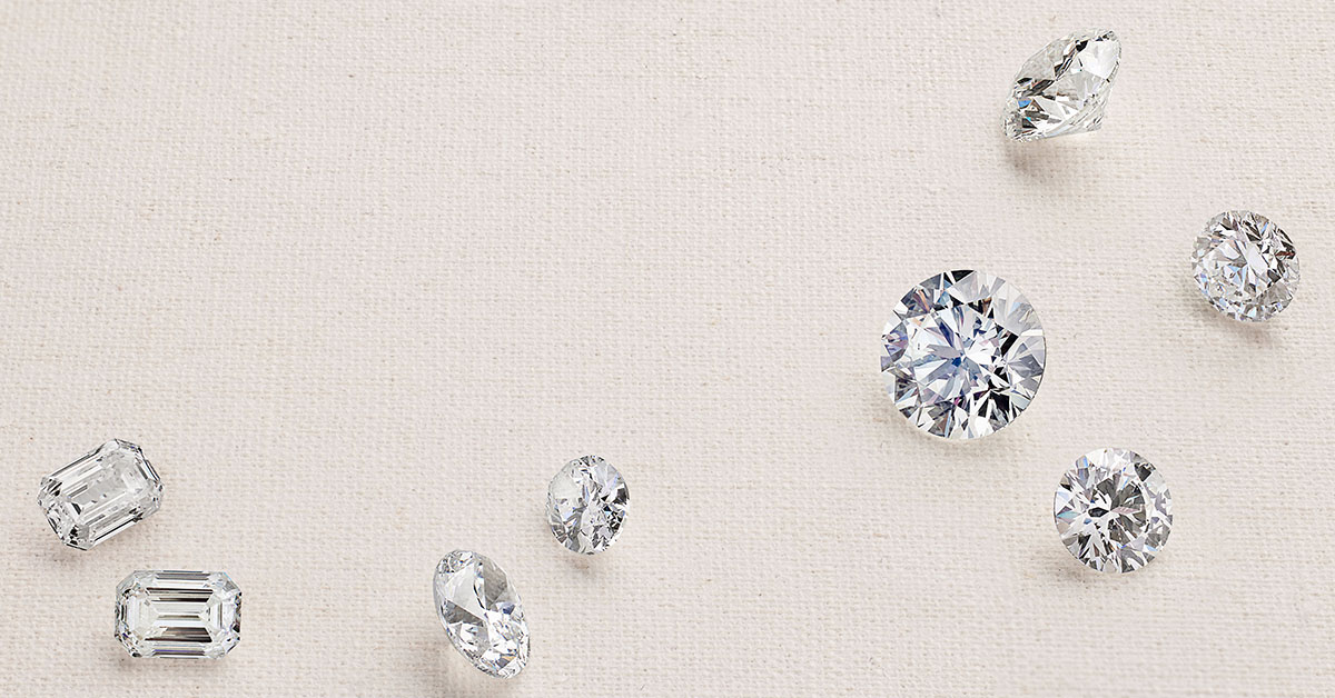 8 loose diamonds including emerald, oval and round diamonds.