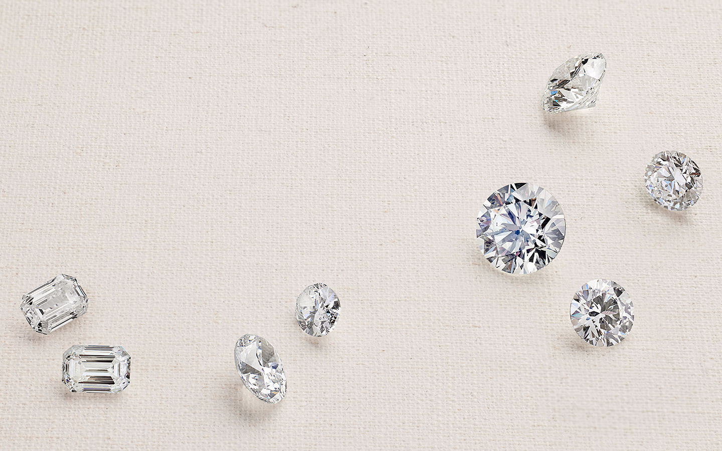 Loose diamonds in shapes such as round, oval and emerald. 