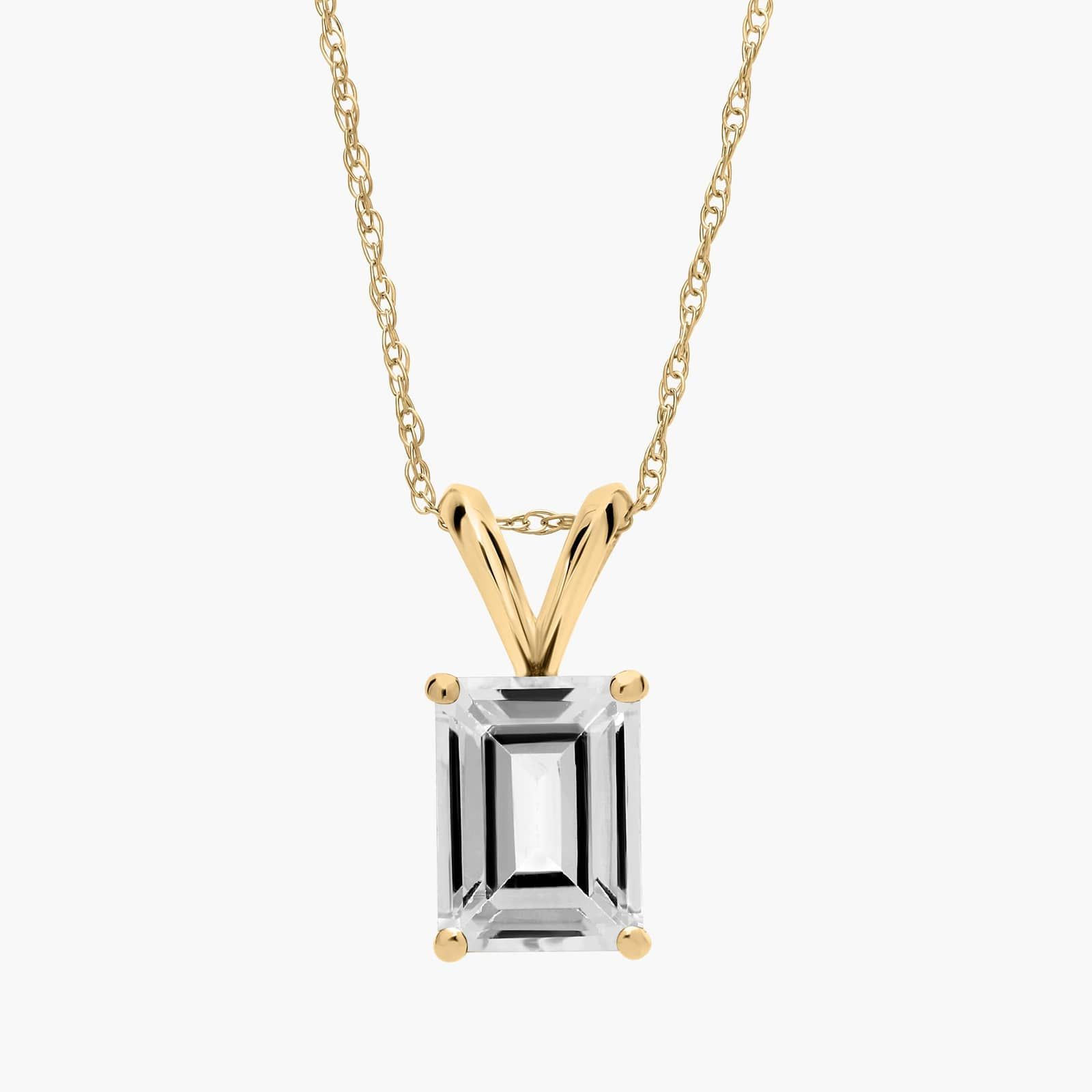 Emerald Cut Birthstone White Topaz Pendant Necklace in 14K Yellow Gold (8x6mm)