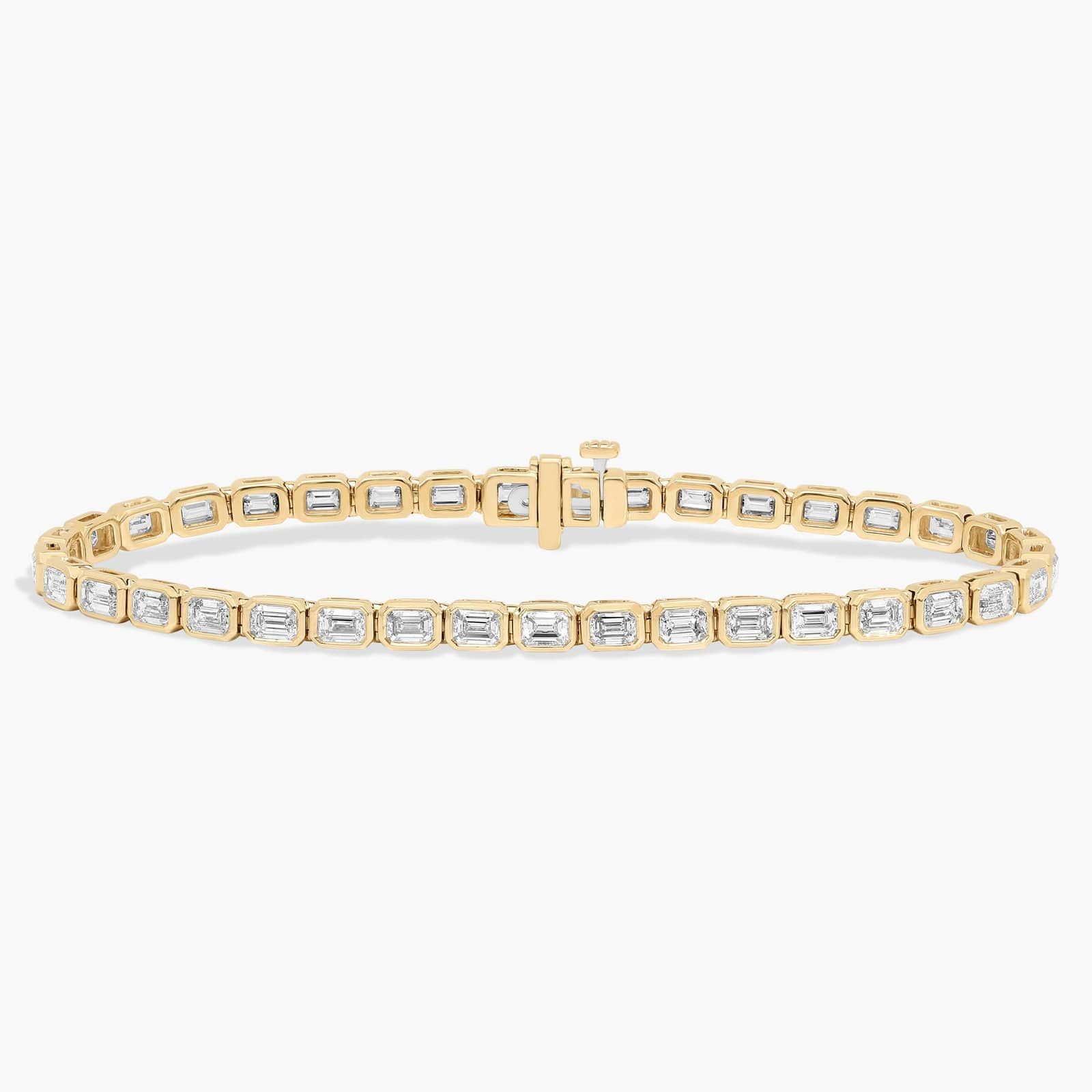 Emerald Cut Lab Grown Diamond E/W Bezel Set Tennis Bracelet In 14K Yellow Gold