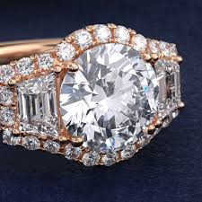 The Gallery Collection™ Emerald Three Stone Halo Diamond Engagement Ring in 14k Rose Gold (1.50 ct. tw.)