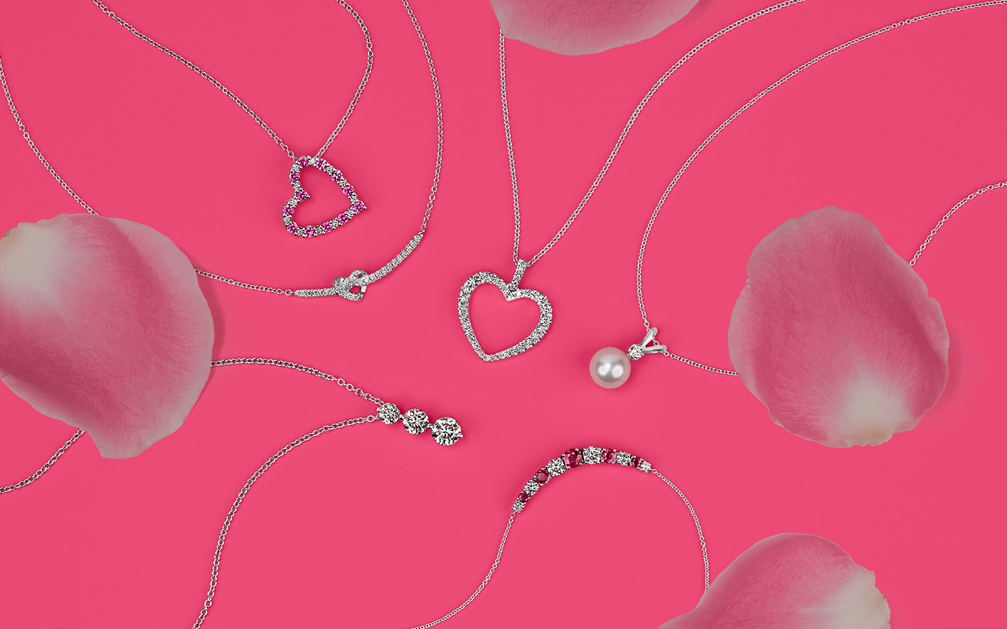 Gold, gemstone and diamond necklaces including two heart necklaces. 