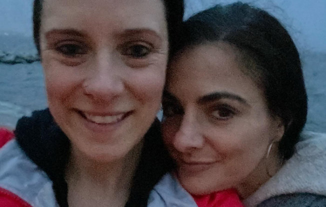 Kat and lauren on beach at twilight