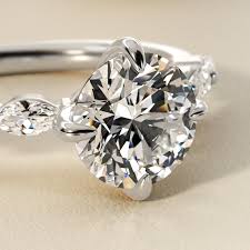 Marquise Cut Side Stone Diamond Shared Prong Engagement Ring In Platinum