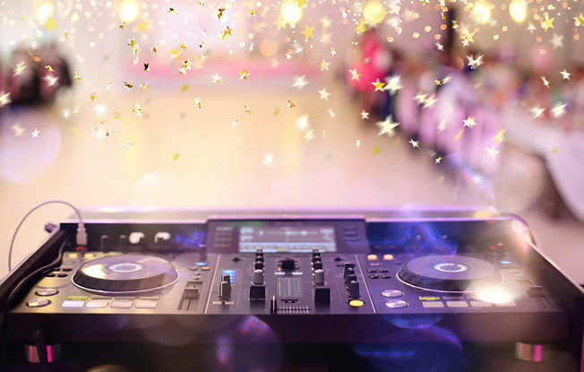 DJ deck surrounded by falling confetti