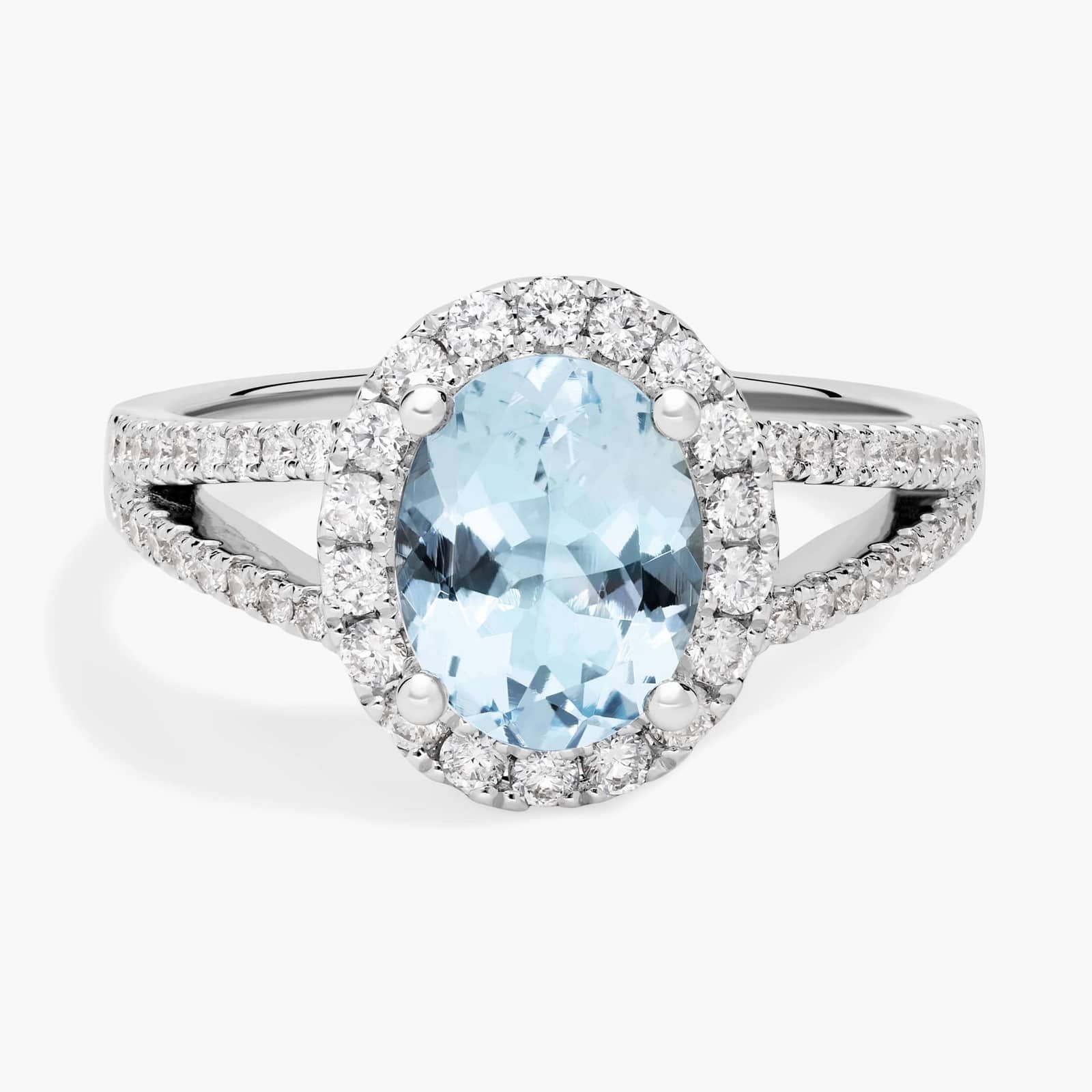 Oval Aquamarine and Diamond Halo Split Shank Ring