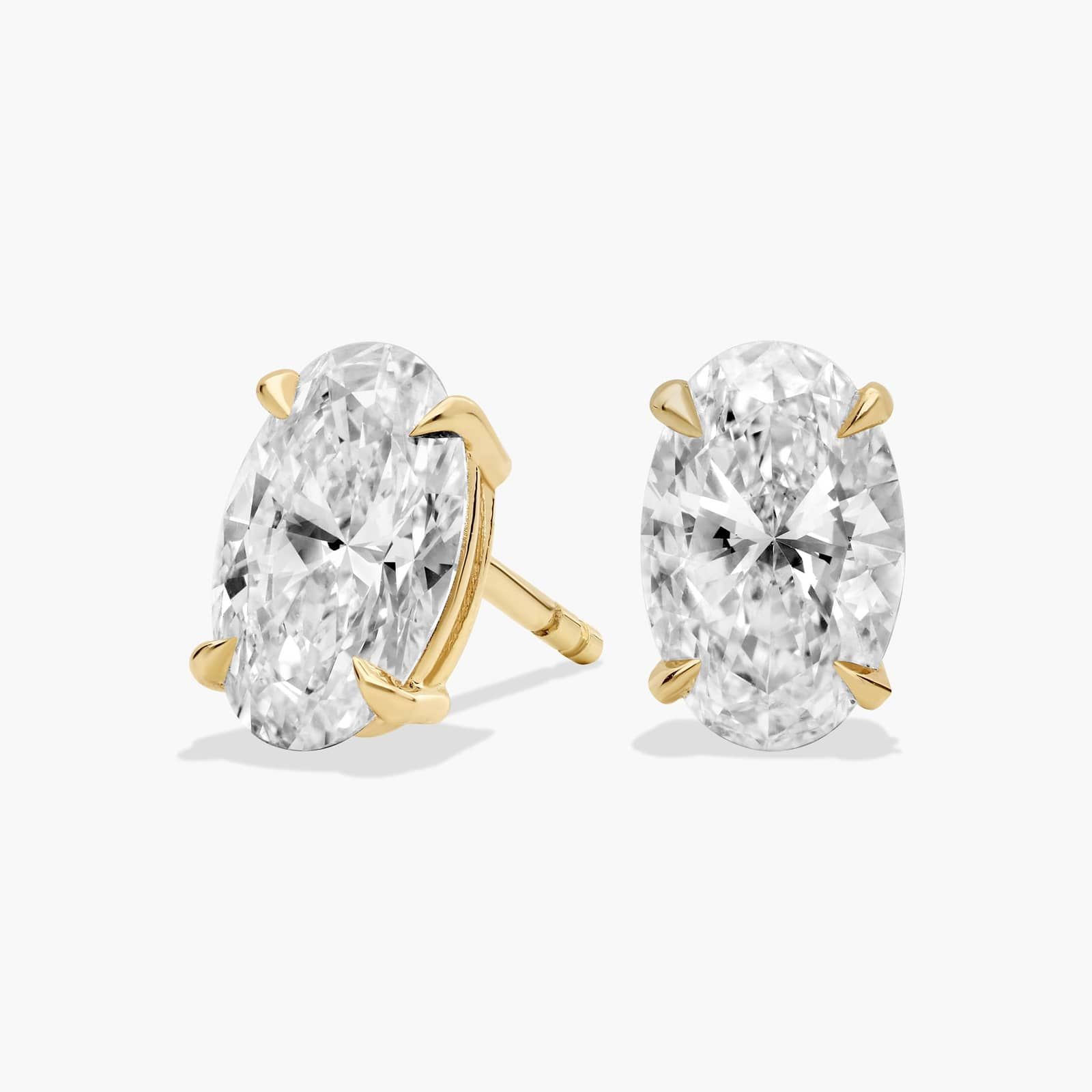 Oval Cut Lab-Grown Diamond Stud Earrings In 14K Yellow Gold
