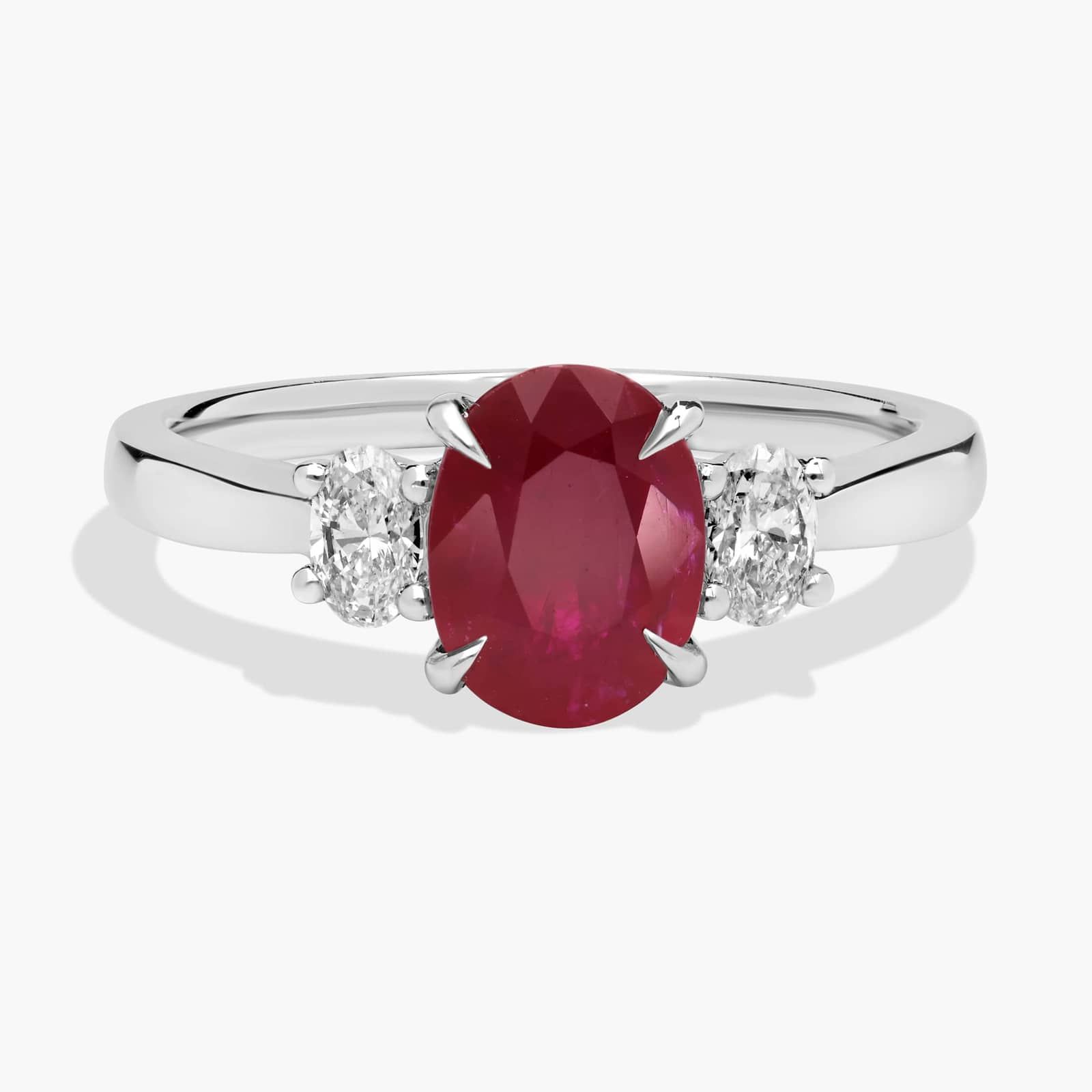 Oval Ruby and Diamond Sunburst Halo Ring in 14k Rose Gold