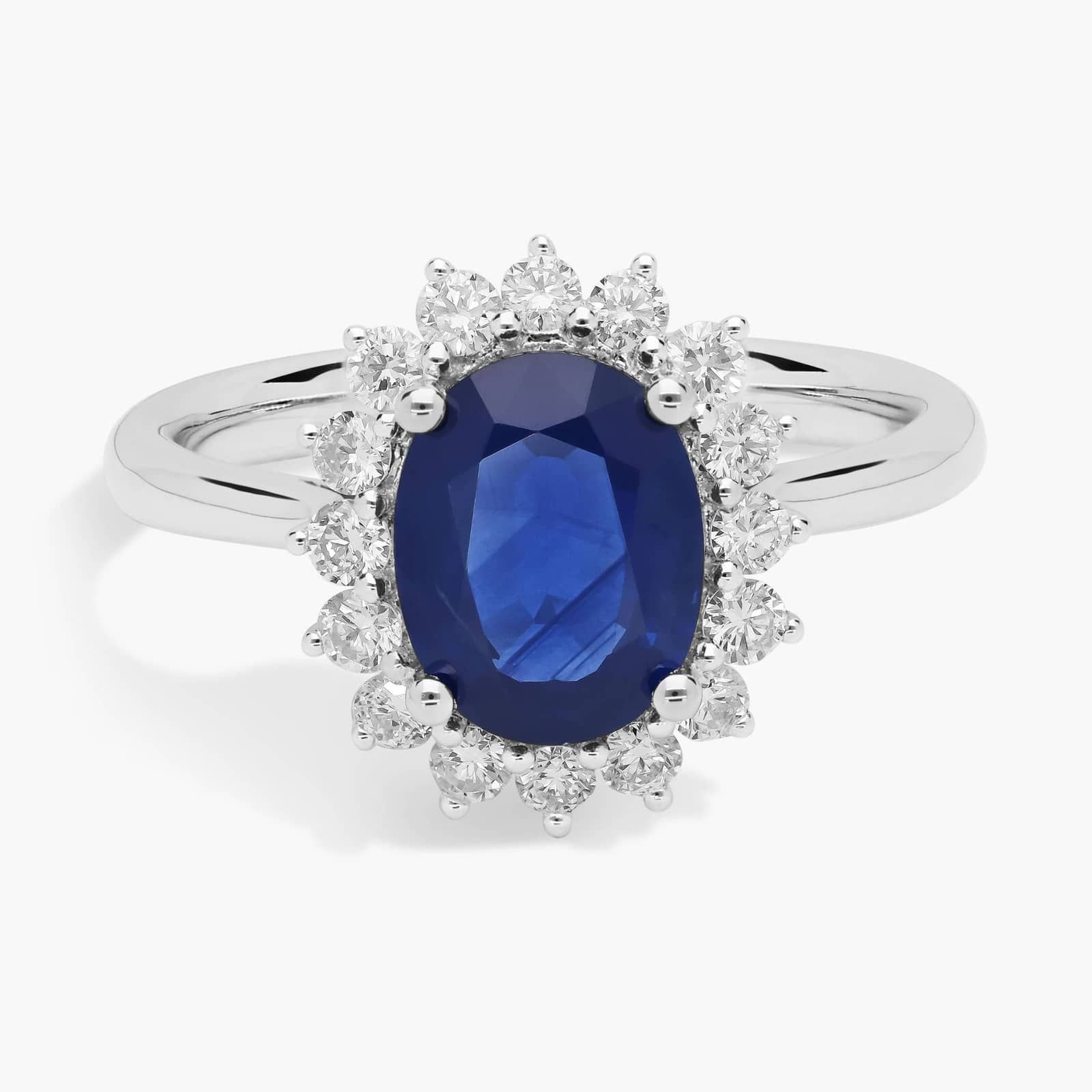Oval Sapphire and Diamond Sunburst Halo Ring in 14k White Gold