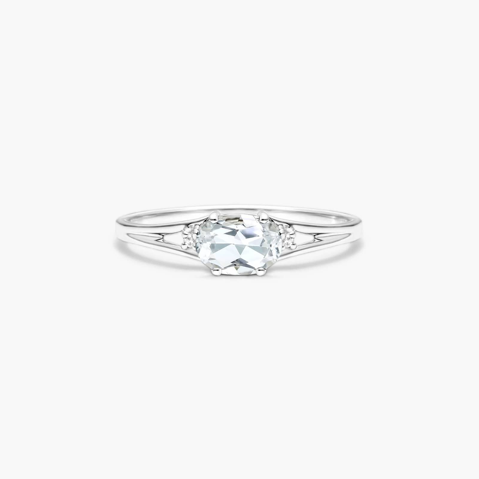Oval White Topaz And Diamond Accent Birthstone Ring In 14K White Gold