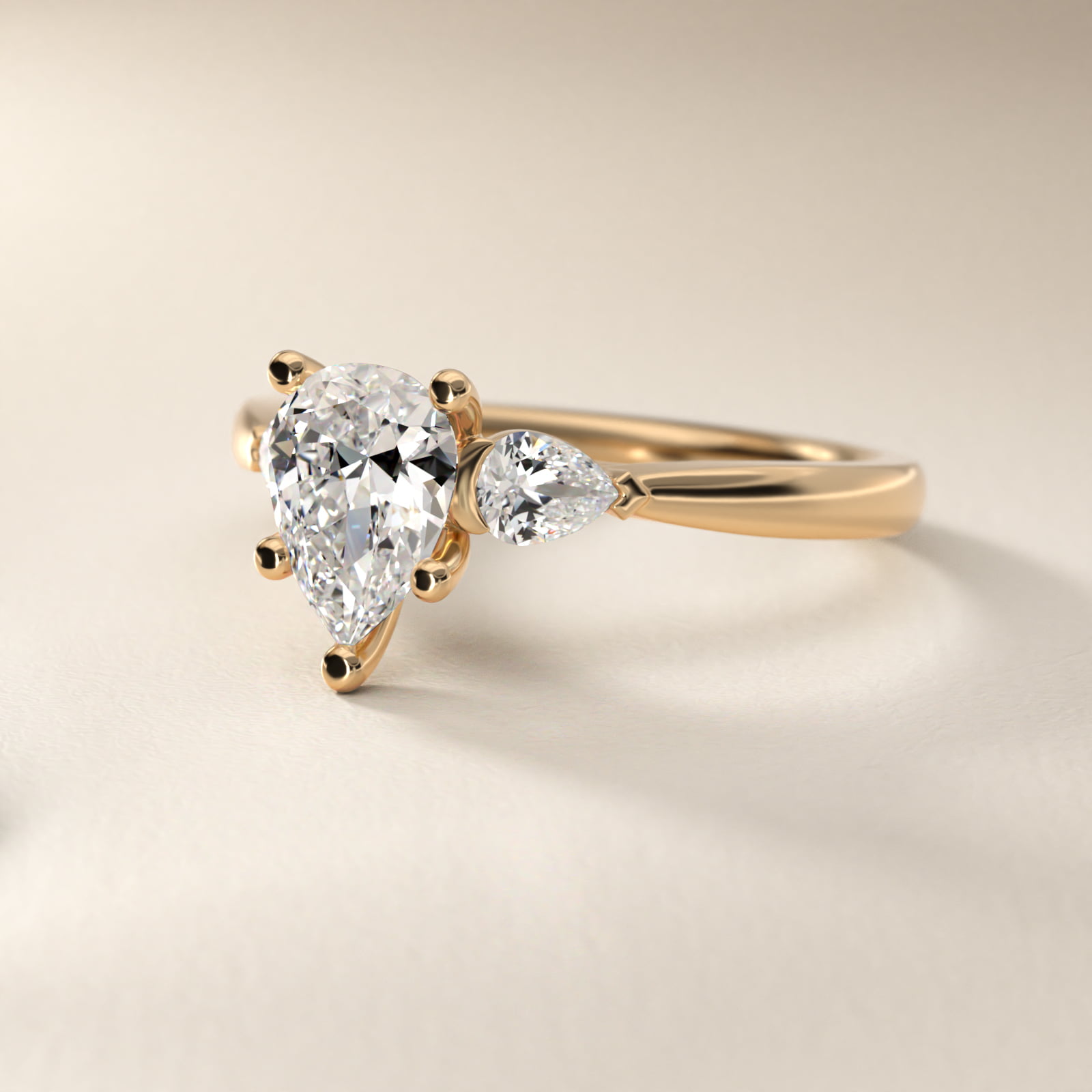 Pear Sidestone Diamond Engagement Ring in 14k Yellow Gold 