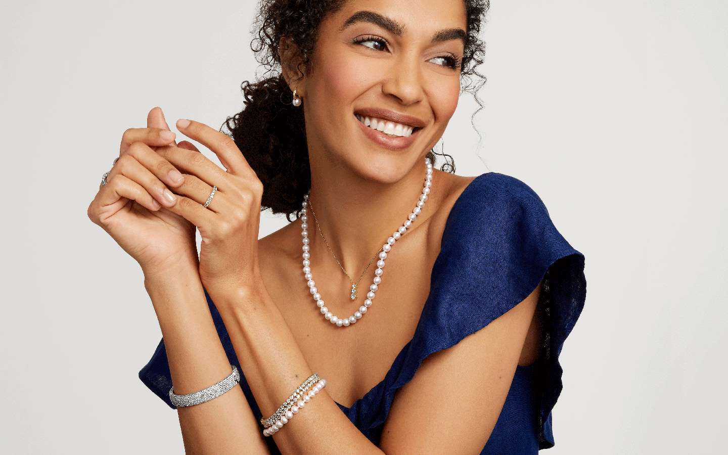 Woman wearing pearl jewelry
