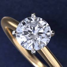 Petite Solitaire Engagement Ring in 14k Yellow Gold