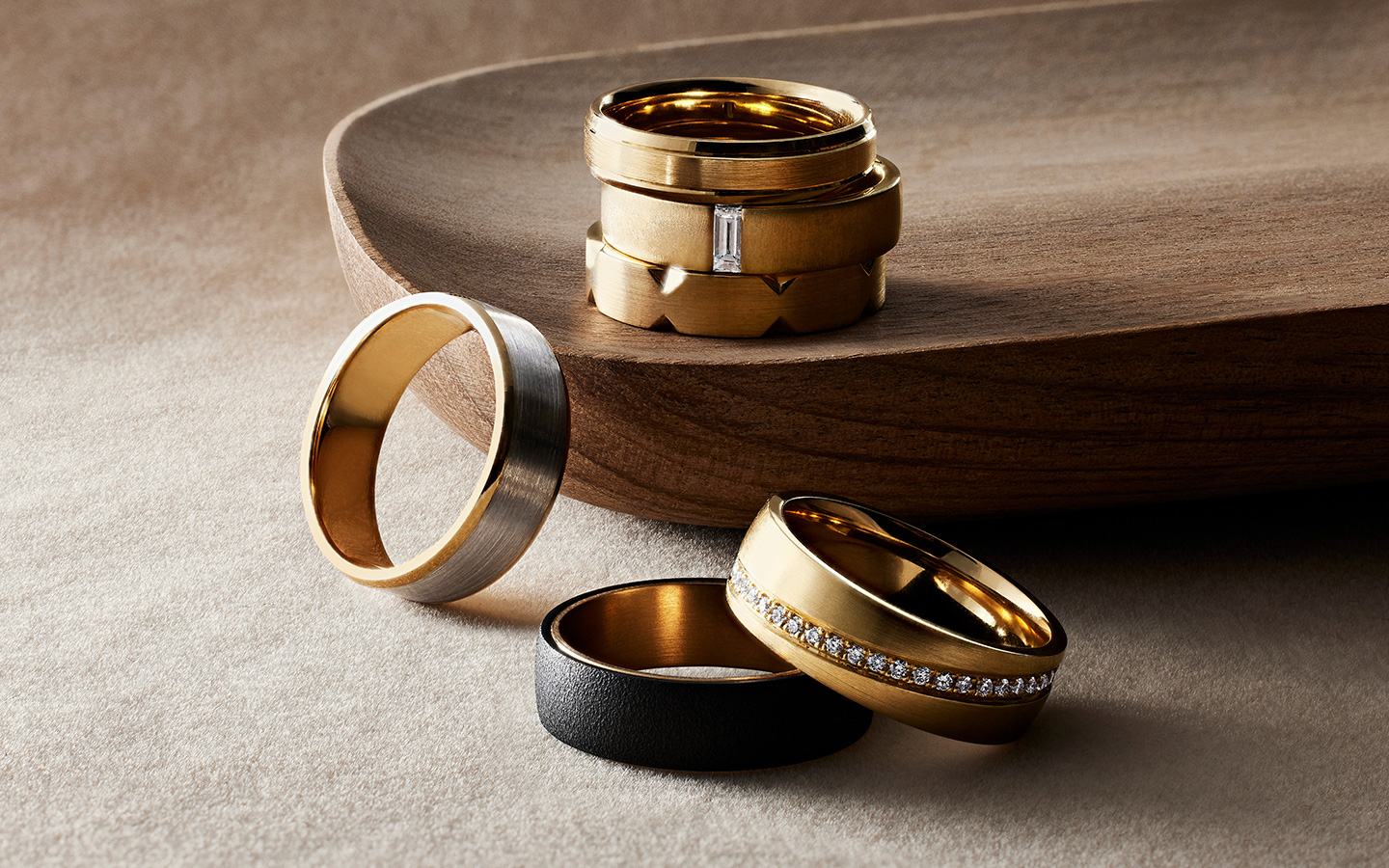 Men’s wedding bands including non-resizable tungsten and eternity rings.