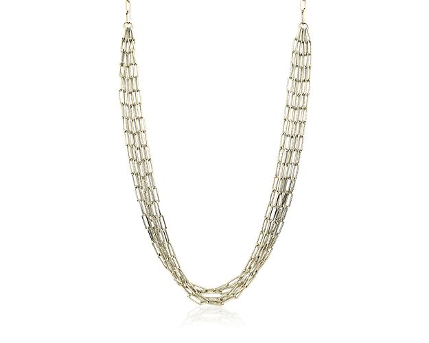 Statement necklace in gold.