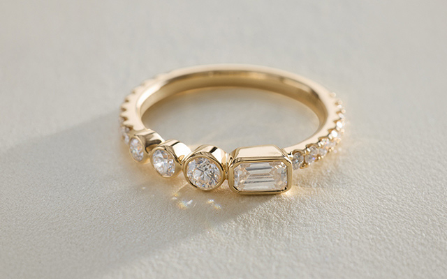 Bezel set diamond ring in 14k yellow gold
