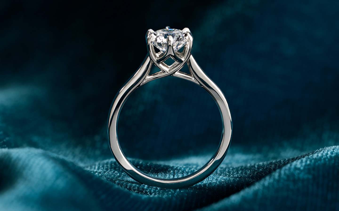 Solitaire cathedral engagement ring 