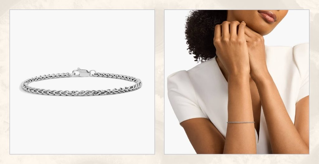 Woman wears silver chain bracelet.