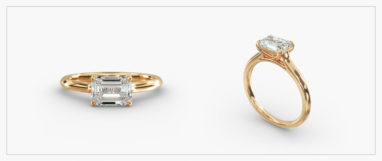 Front and side views of a yellow gold diamond east-west ring