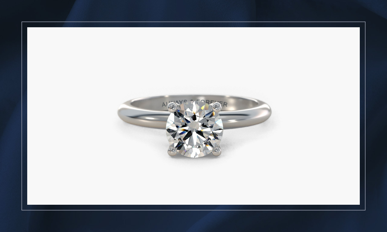 A sterling silver engraved ring. 