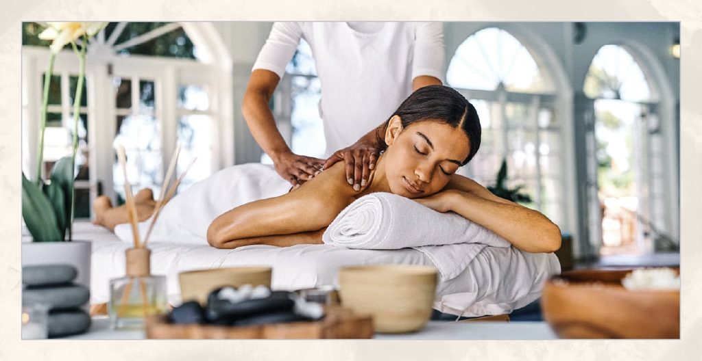 Woman receives a massage in a spa.