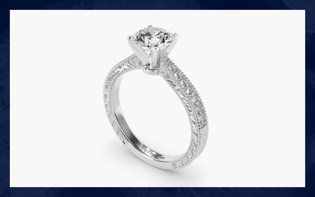 "My Player Two" engraved on an engagement ring.