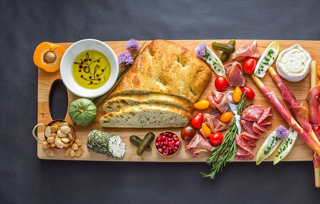 JK Adams Grafton cherry wood serving board with charcuterie