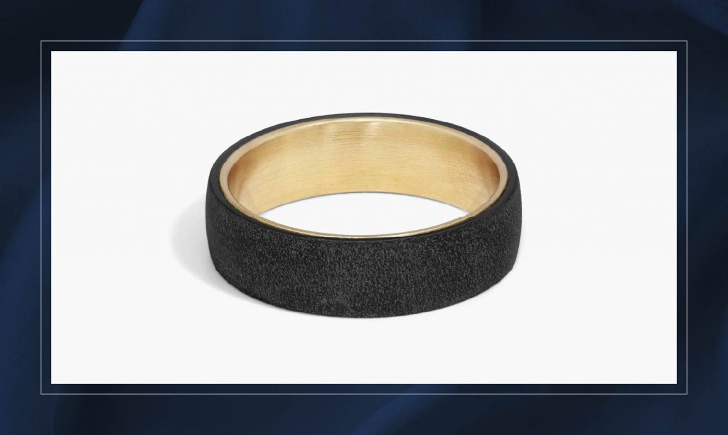 A modern metal Blue Nile wedding band.