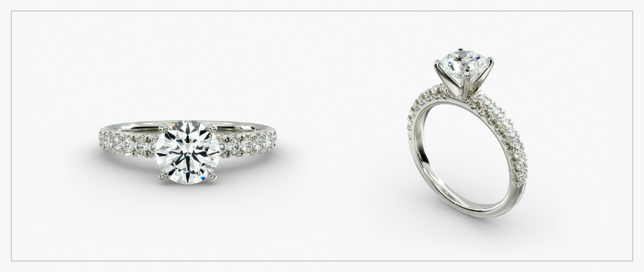 Front and side views of a platinum diamond French pavé ring