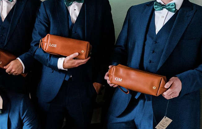 A leather night bag embroidered with custom initials from MAHI leather