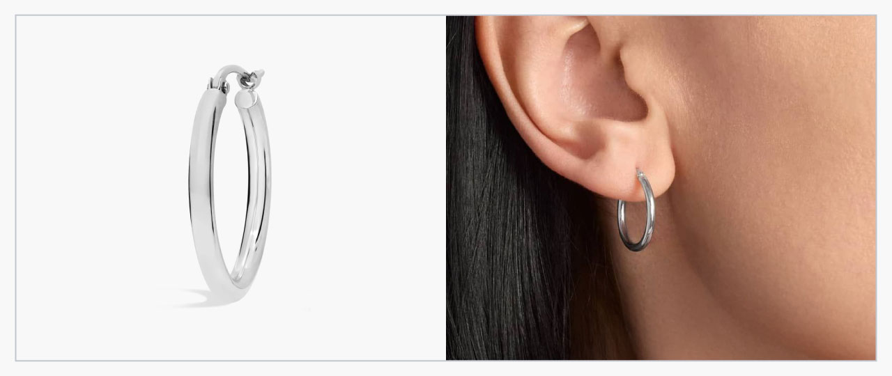 One small Blue Nile platinum hoop earring on the left and a close-up of a model wearing them on the right.
