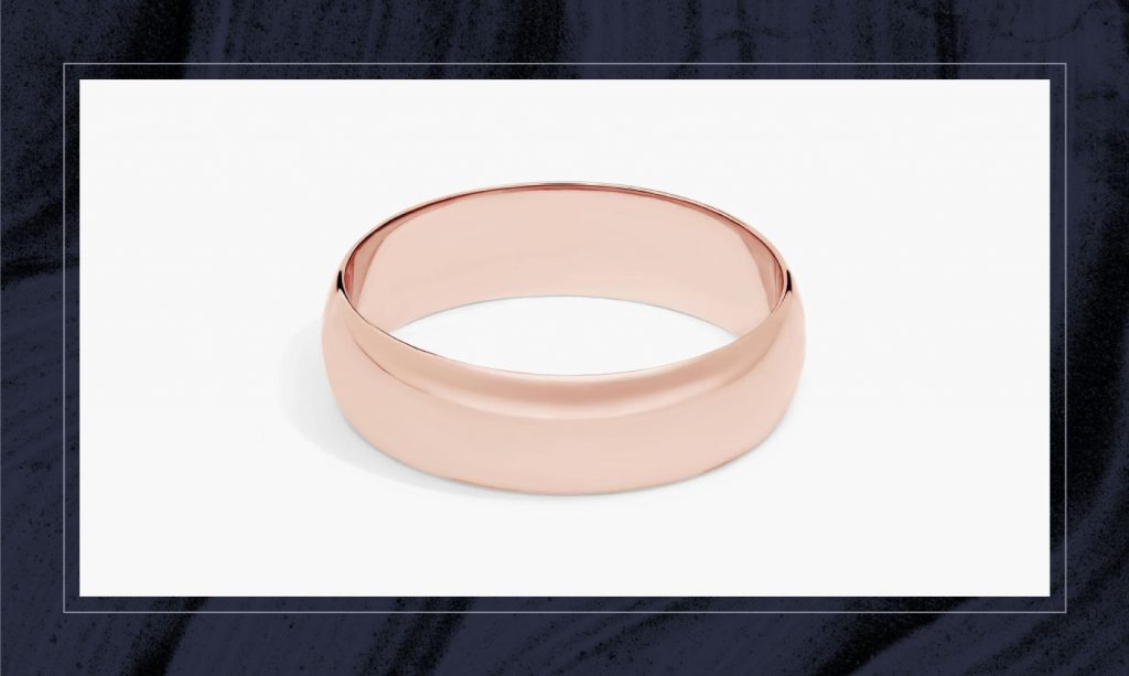 A rose gold men's wedding band.