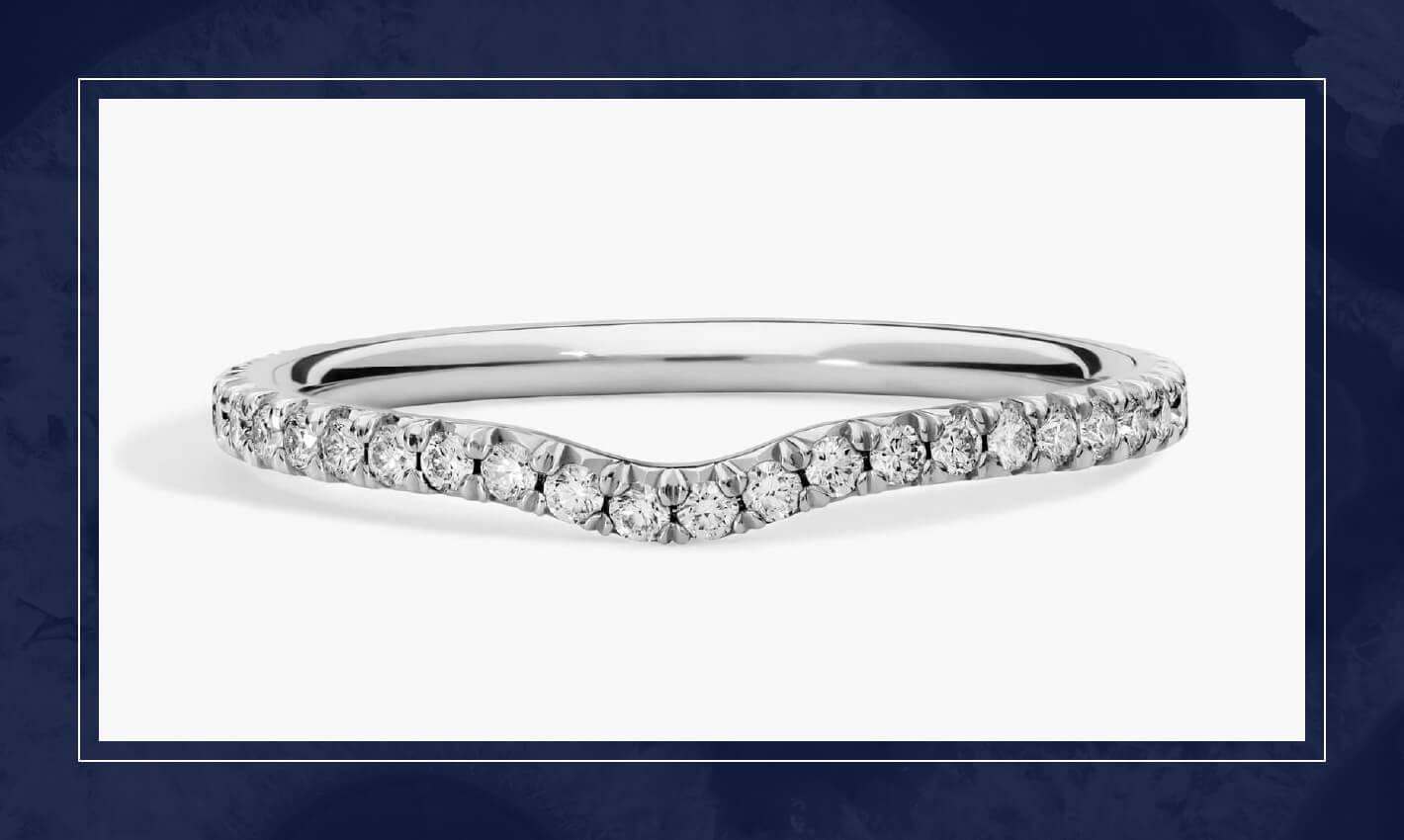 White gold chevron style diamond ring with pavé set round diamonds, shaped to nest neatly with engagement or stacking rings.