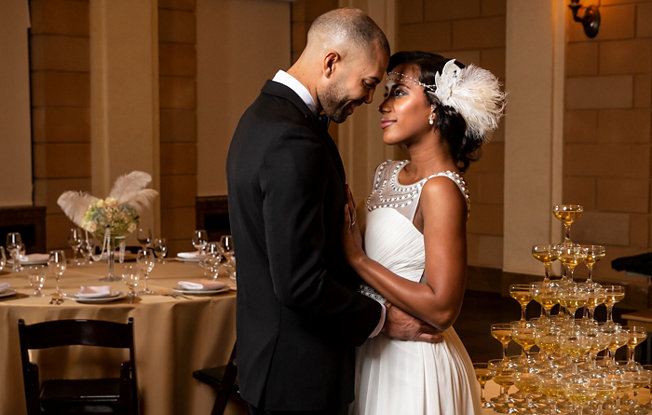 A couple dressed in 1920s wedding attire celebrating their wedding at The Mob Museum in Las Vegas